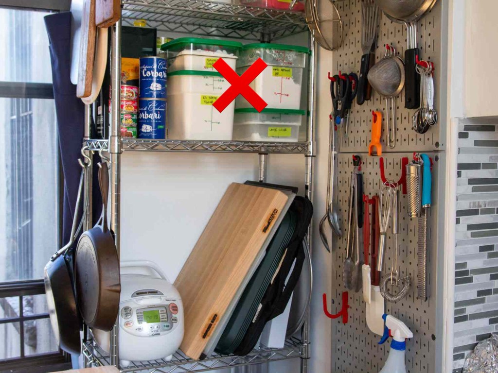 Don't put heavy stuff on  top shelf in restaurant kitchen