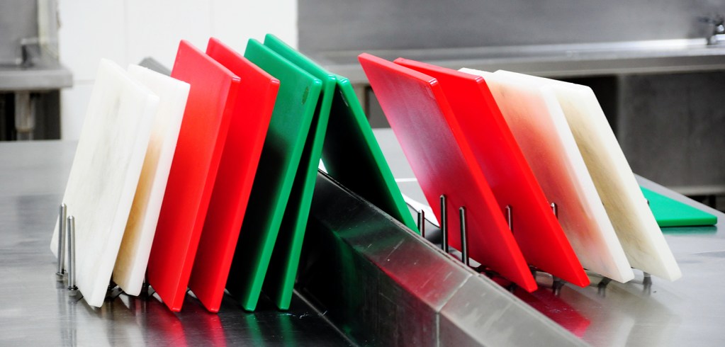 Different coloured chopping boards